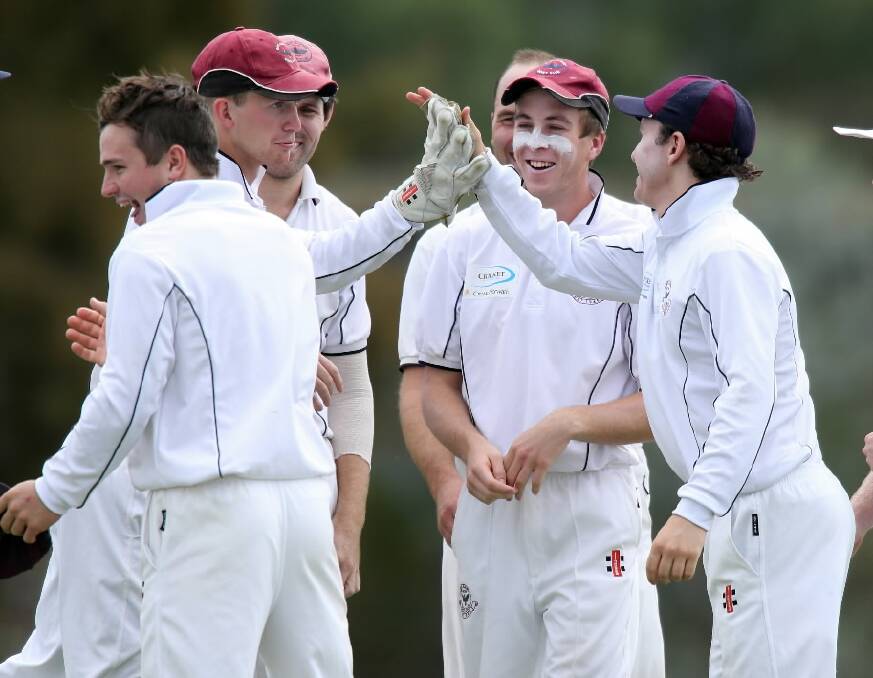 East Albury players celebrate the dismissal of Belvoir’s Michael Russell.