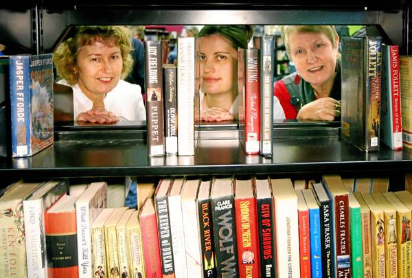 Redundant library staff Allison Smyth, Liz Shatford and Dianne Whittaker make a last tour of the bookshelves. Picture: TARA ASHWORTH