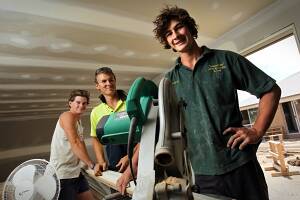 Apprentice carpenters James McCabe, 20, of Wodonga, Brendon Manson, 19, of Albury, and Andrew Cowhan, 19, of Albury say the job keeps them fit. Pictures: BEN EYLES