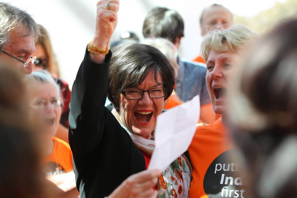 Member for Indi Cathy McGowan enjoys a singalong with supporters in Canberra yesterday.