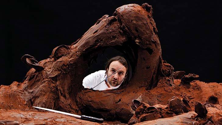 Sweet dreams ... Paris chocolatier Patrick Roger and a giant hippopotamus carved from a seven-metre chocolate bar.