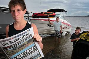 Charlie Jackson, his brother Mackenzie, 9, and dad Greg were on board the boat featured on the front page of yesterday&rsquo;s Border Mail.Picture: KYLIE ESLER