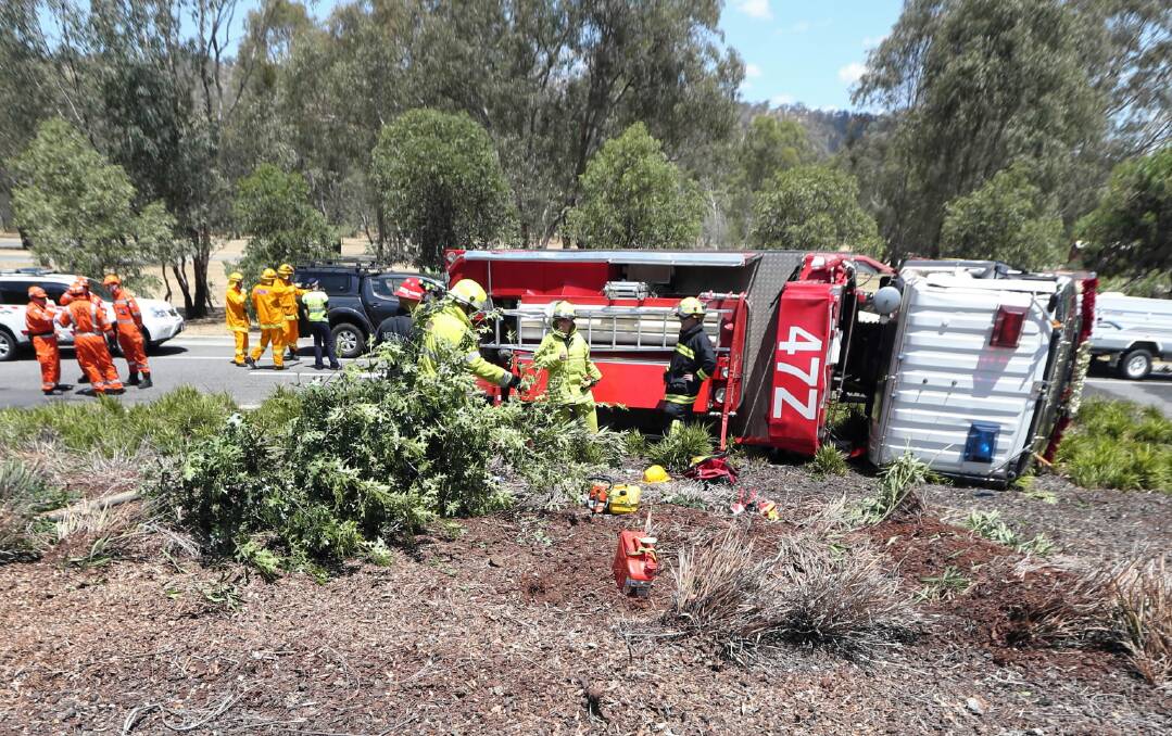 A Baranduda CFA truck rolled on its way to a Wodonga house fire yesterday. Picture: John Russell