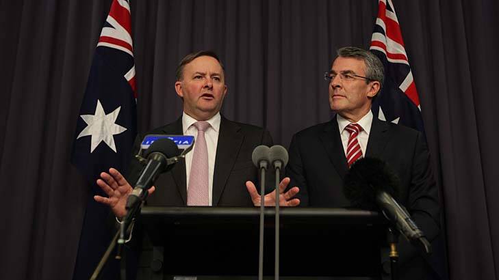 Local Government Minister Anthony Albanese and Attorney-General Mark Dreyfus reveal proposed changes to the constitution's wording to recognise local government. Photo: Alex Ellinghausen 