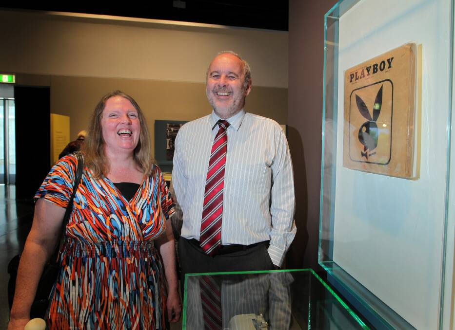 Cheryl Newman and Ron Hooton have a laugh yesterday when they learnt a Braille Playboy from 1974 was on display at the Albury Library Museum. Picture: DAVID THORPE