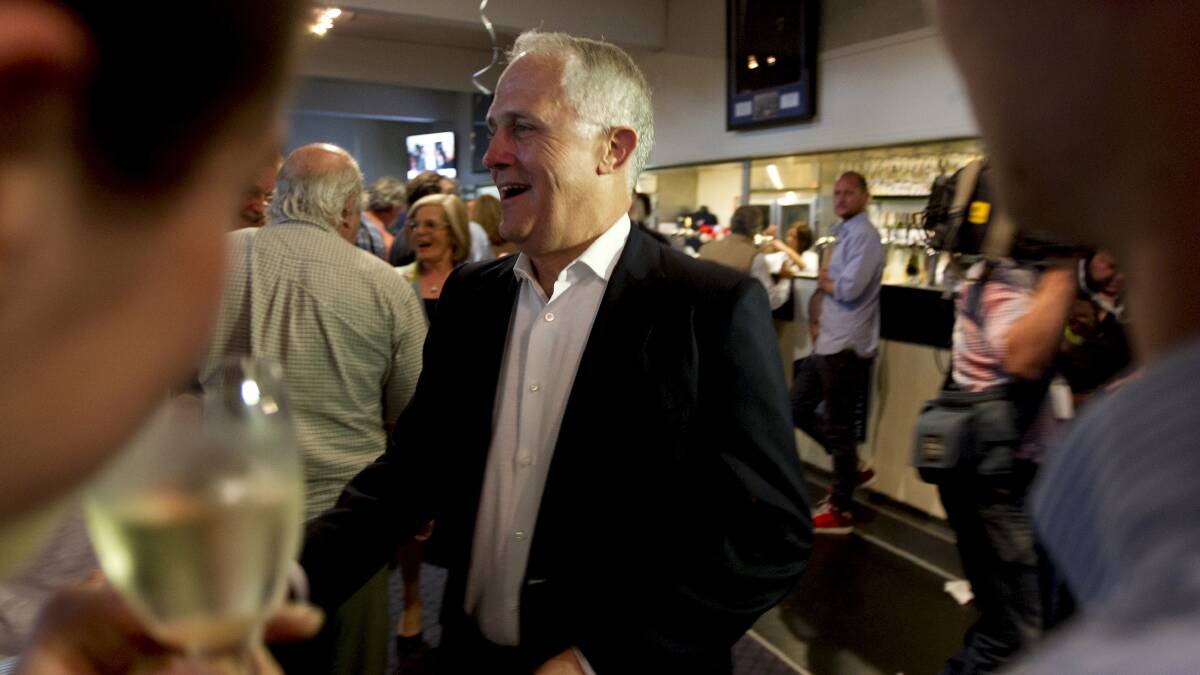 Wentworth candate Malcolm Turnbull arrives with wife Lucy at a function in Rose Bay on election night. Photo: JENNY EVANS