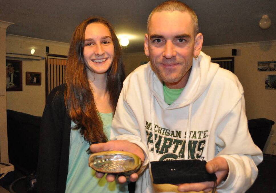 Stevie McDougall and his daughter Sarah with the tiny pearls found in an abalone.