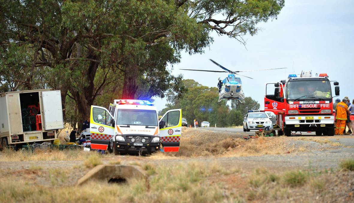 The SouthCare helicopter arrives at the crash scene where a Coolamon man hit a tree about 20 kilometres from Coolamon, NSW. Picture: Alastair Brook