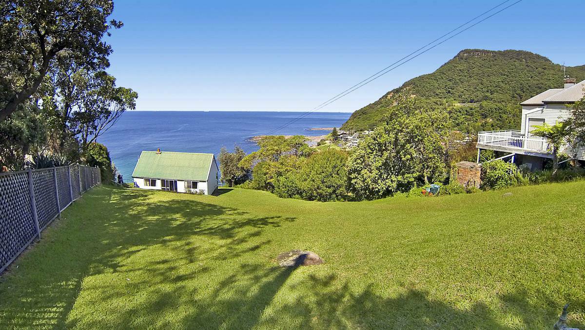 The pint-sized Coalcliff cottage on the NSW south coast is not much bigger than a luxury motel room but it's valued at between $1.6 million and $1.74 million. 