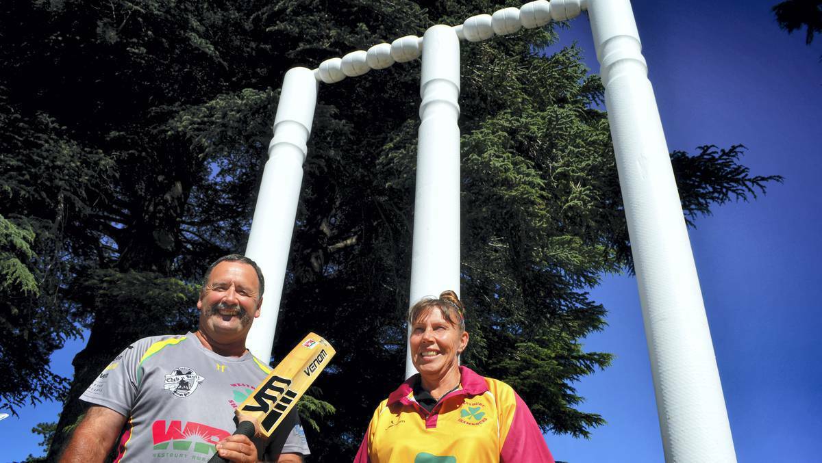 Westbury Cricket Club's Michael and Gale Claxton with the big stumps, under consideration for a Guinness World Record in Tasmania.