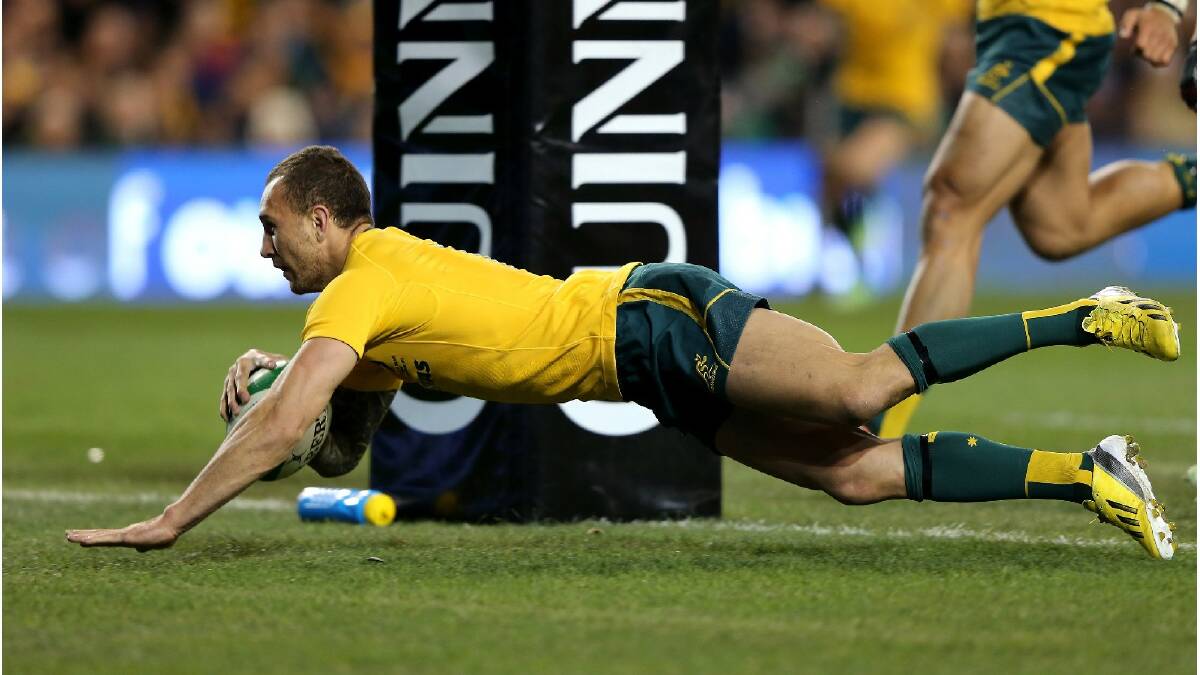 Quade Cooper of Australia scores a try during the International match between Ireland and Australia. Photo: Getty Images.