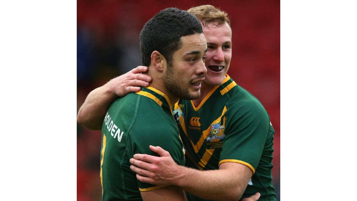 Jarryd Hayne of Australia celebrates with Daly Cherry-Evans after scoring his fourth try during the Rugby League World Cup Quarter Final match between Australia and the USA. Photo: Getty Images.