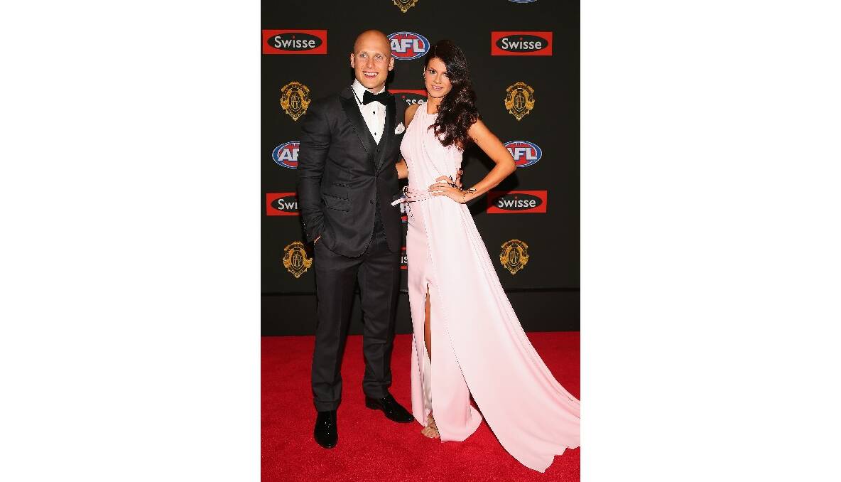 Gary Ablett and partner Jordan Papalia arrive at the Brownlow Medal count. Photo: Getty Images.