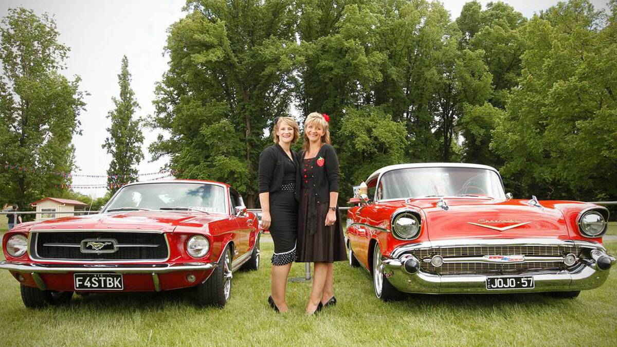 BORDER MAIL: Melbourne's Joanne Woodhouse and Debbie Dalrymple with their '67 Fastback Mustang and 1957 Chevrolet. Picture: BEN EYLES