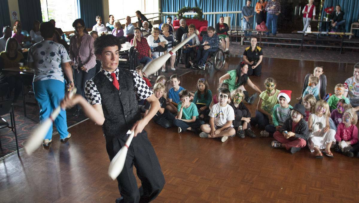 MERIMBULA NEWS WEEKLY: Young magician Rhys Davies entertains at Bermagui's International Day of People With Disability event. 