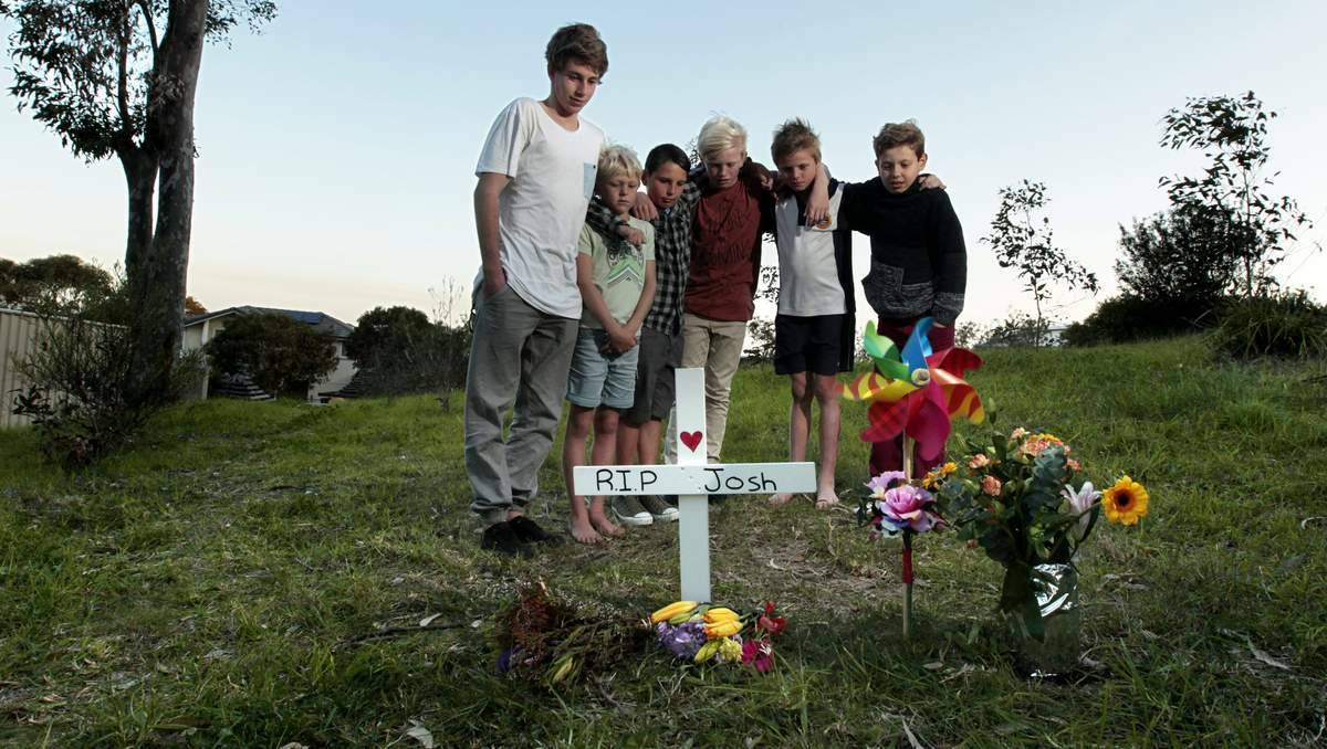 Josh Caruso’s brothers Nicholas, left, and Bayley, right with Wil Botham, Jack Smith, Brock Locking and Aidan Storrie at his memorial yesterday. Picture: Jonathan Carroll