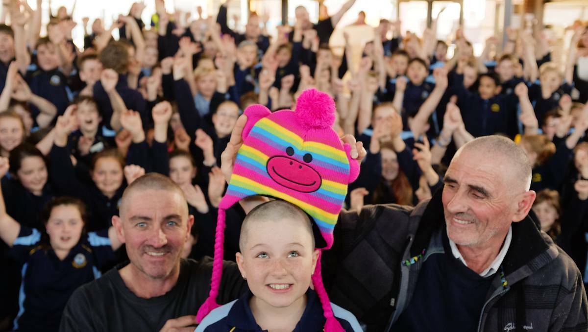BURNIE: Mark, Dakota and Beven King had their heads shaved for a cure at Burnie Primary School. Picture: Grant Wells. 