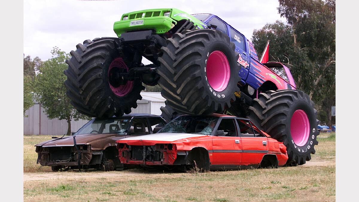  Bill Luther drives his monster truck over some car wrecks as a promo for a show to be held at the Albury Showgrounds. Picture: MATTHEW SMITHWICK
