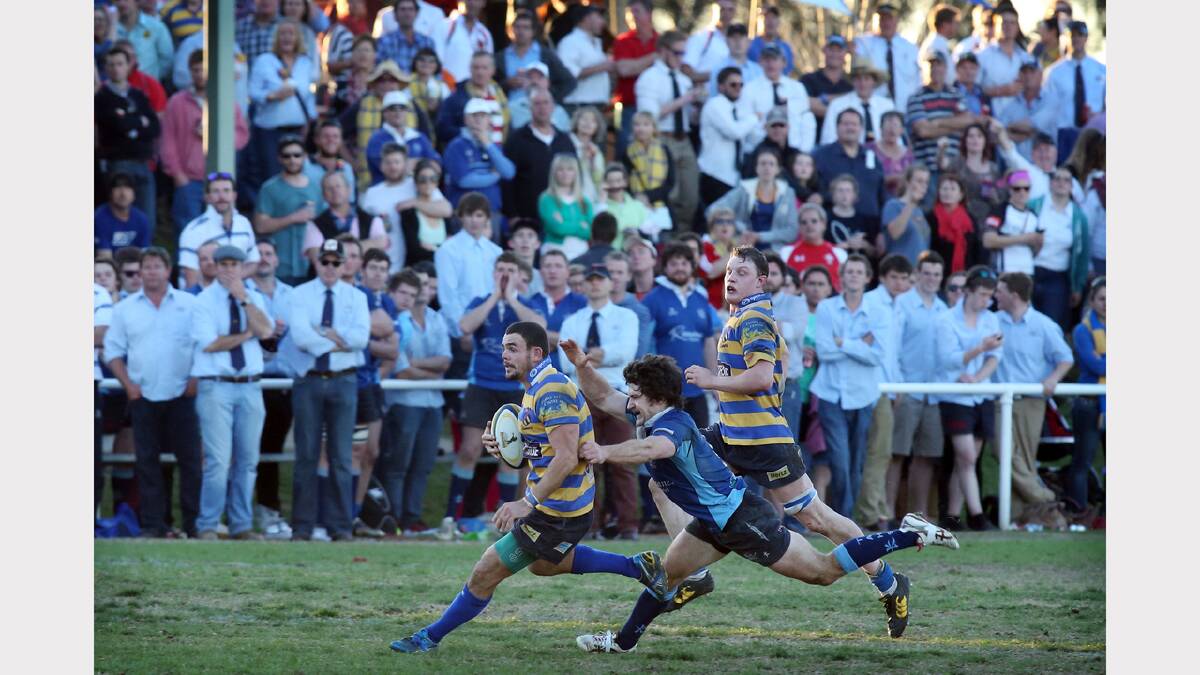 Steamers' Liam Krautz and Waratahs' Sam Hobbs in action in front of a decent Wagga crowd.