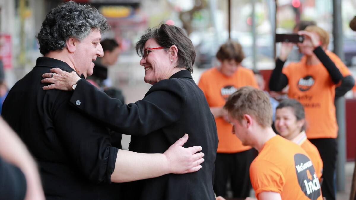 Cathy McGowan with Vince Pitari of Pitari’s Cafe Centro in Wangaratta yesterday. Picture: JOHN RUSSELL