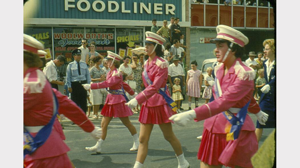 Marching girls take part in a floral festival in the mid-1960s.