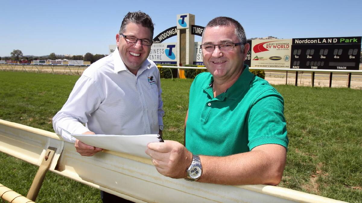 Tom O’Connor and Bernie Squire discuss a possible Wodonga Cup holiday. Picture: MARK JESSER