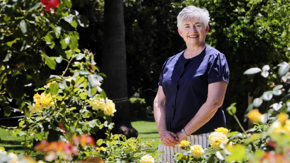 Colleen Drum has stopped to smell the roses after almost 30 years as a baby nurse. Picture: MARK JESSER