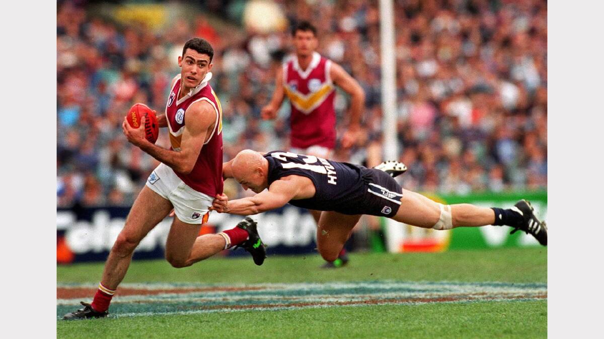 Chiltern native Nigel Lappin burst on the AFL scene for Brisbane in 1994 before going on to win three straight premierships for the Lions in 2001, 2002 and 2003. 