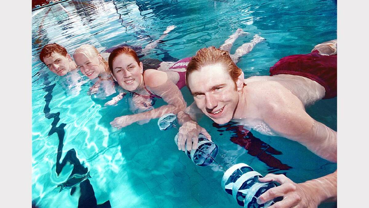 New Wodonga Swimming Club captains Nick Phillips,17, (right) and Hayley Broad,16, (second from left) and vice-captains Tom Docherty,15, and Melissa Currell,16, (second from right). Picture: CHRIS McCORMACK.