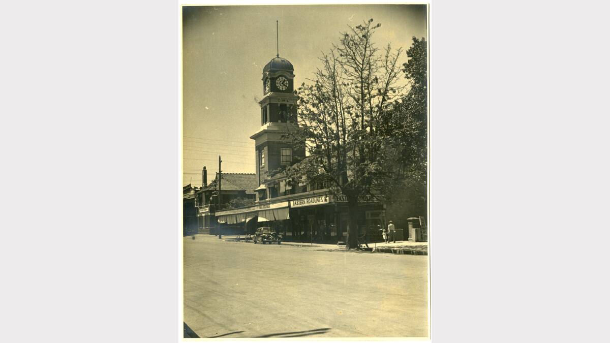 1950s photograph looking north-east along Olive Street, Albury, towards intersection with Dean Street. CML building with prominent clocktower in centre. Picture: ALBURYCITY COLLECTION