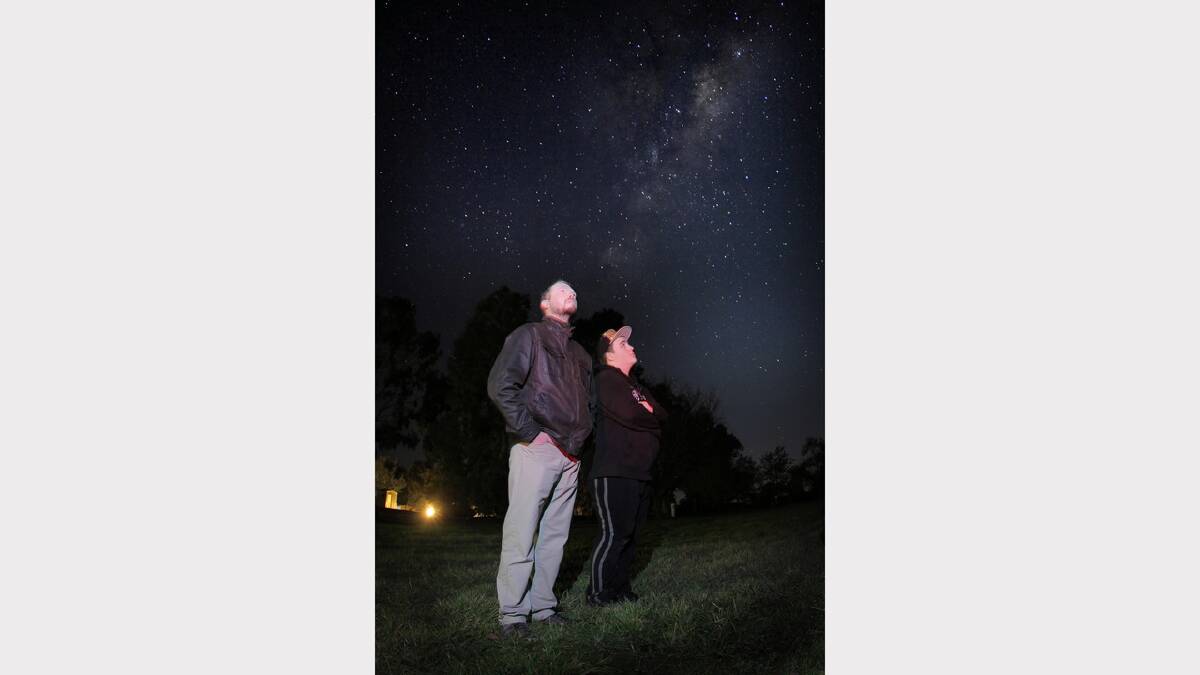 Dr Duane Hamacher spoke to Border students, including Tristan Barby-Privett, 14, about indigenous astronomy last night. Picture: TARA GOONAN