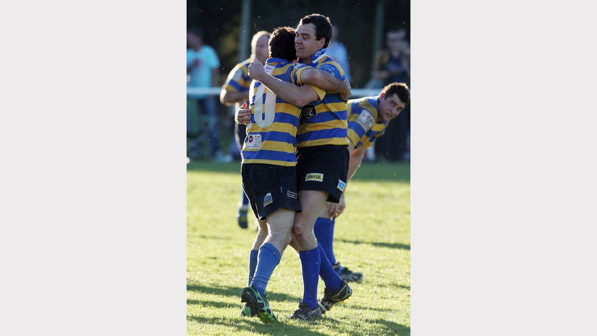 Steamers' Richard Manion and Justin Wheatley celebrate a try.