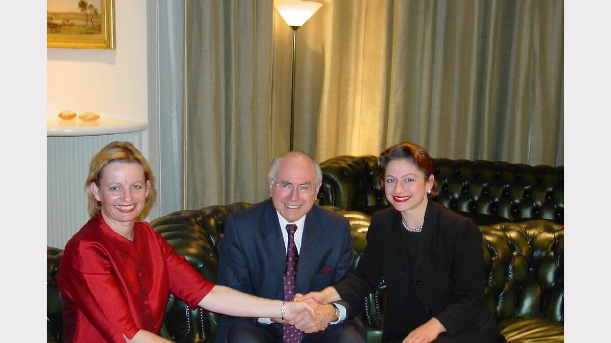 Member for Farrer Sussan Ley, Prime Minister John Howard and Member for Indi Sophie Mirabella (nee Panopoulos) celebrate the deal for funding of the Albury-Wodonga bypass in 2002. 