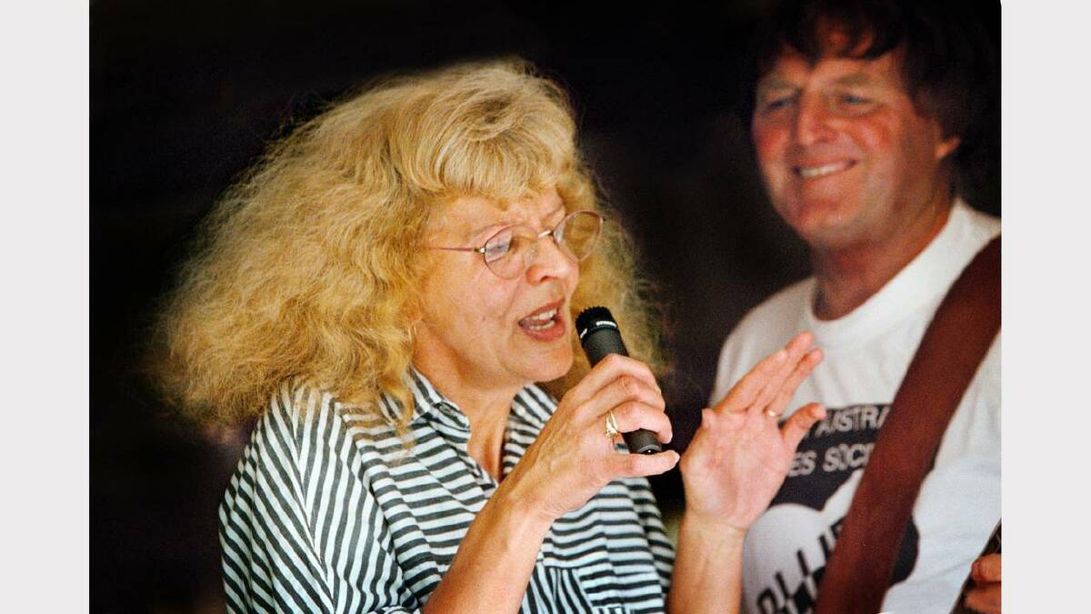 At her home in Mulwala. Adele Meredith (The Harpin' Mama) with bass guitarist Allan Fraser, rehearsing. Picture: PETER BATSON