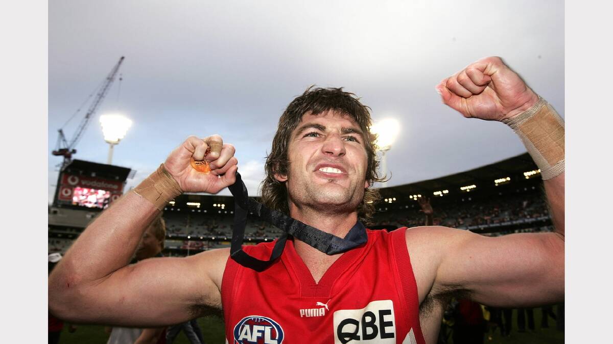 Brett Kirk celebrates victory after the 2005 AFL Grand Final between the Sydney Swans and the West Coast Eagles at the Melbourne Cricket Ground, September 24, 2005. Picture: Getty Images)