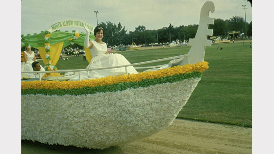 A North Albury Football Club float in a 1960s floral festival “sails” on the Albury Sportsground.