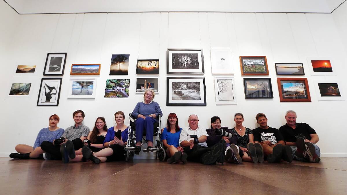 Members of the Albury-Wodonga Photography Facebook group have been flat out preparing for their exhibition at the GIGS Gallery that opens tonight. Picture: JOHN RUSSELL 