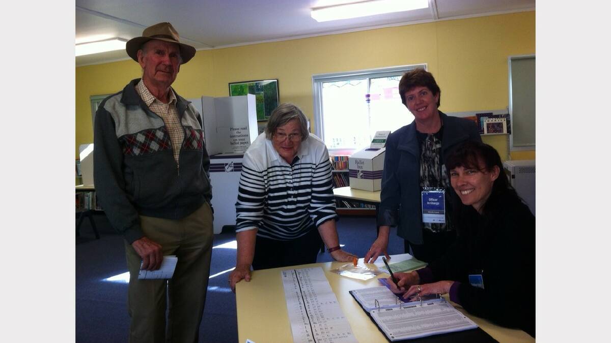 4.15PM: Ian and Deirdre Izon, of Howlong, Karen Lavis, Officer in Charge of the polling place, and Nichola Boyd, Ordinary Vote Issuing Officer, pictured at the polling place at Lowesdale Public School.