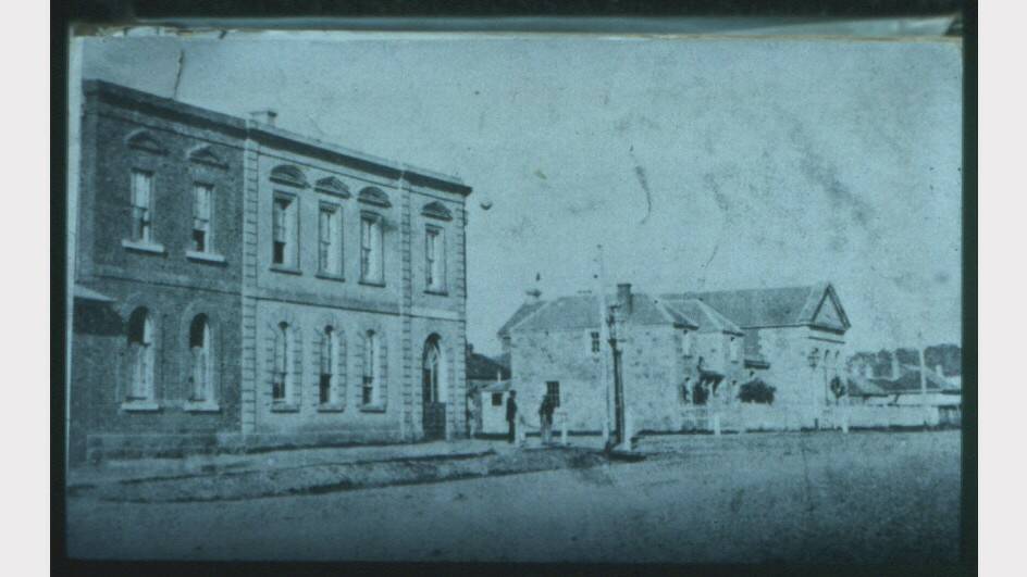 The original Globe Hotel with the former post ofifce and court house beyond. Picture is pre-1870