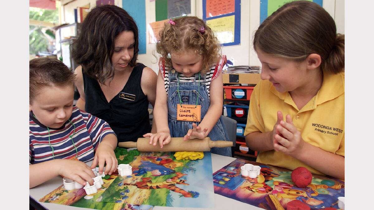 Orientation day at Wodonga West Primary School. Teacher Deb Bowman introduces the fun of play-doh to Ethan Grattidge 5. and Claire Cameron 5. as Year 6 pupil Ashleigh Masters looks on. Picture: RAY HUNT