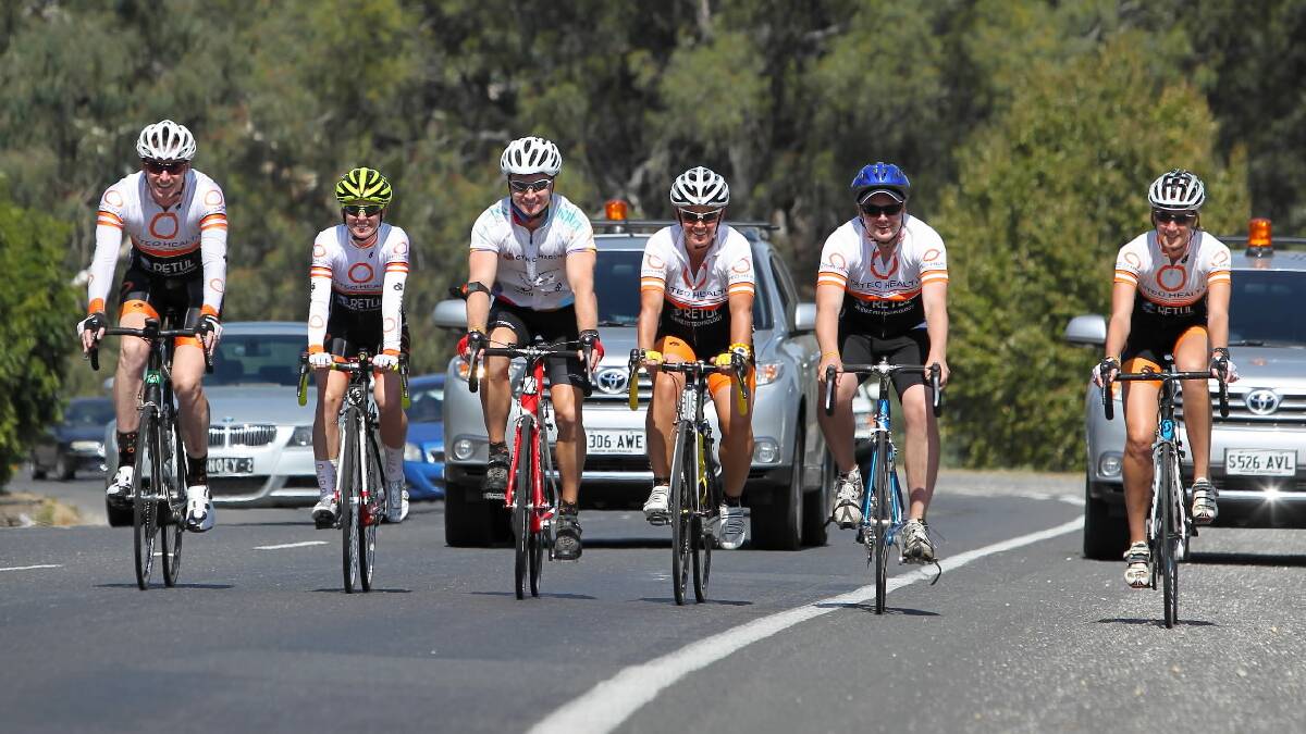  Tom Barry, his wife Lisa Barry, Raphael McGowan, Simone Welch, Andrew Black, and Heidi Poole ride across the Lincoln Causeway in support of Raphael who is cycling from Adelaide to Sydney to help raise awareness and funds for melanoma research. Picture: MATTHEW SMITHWICK
