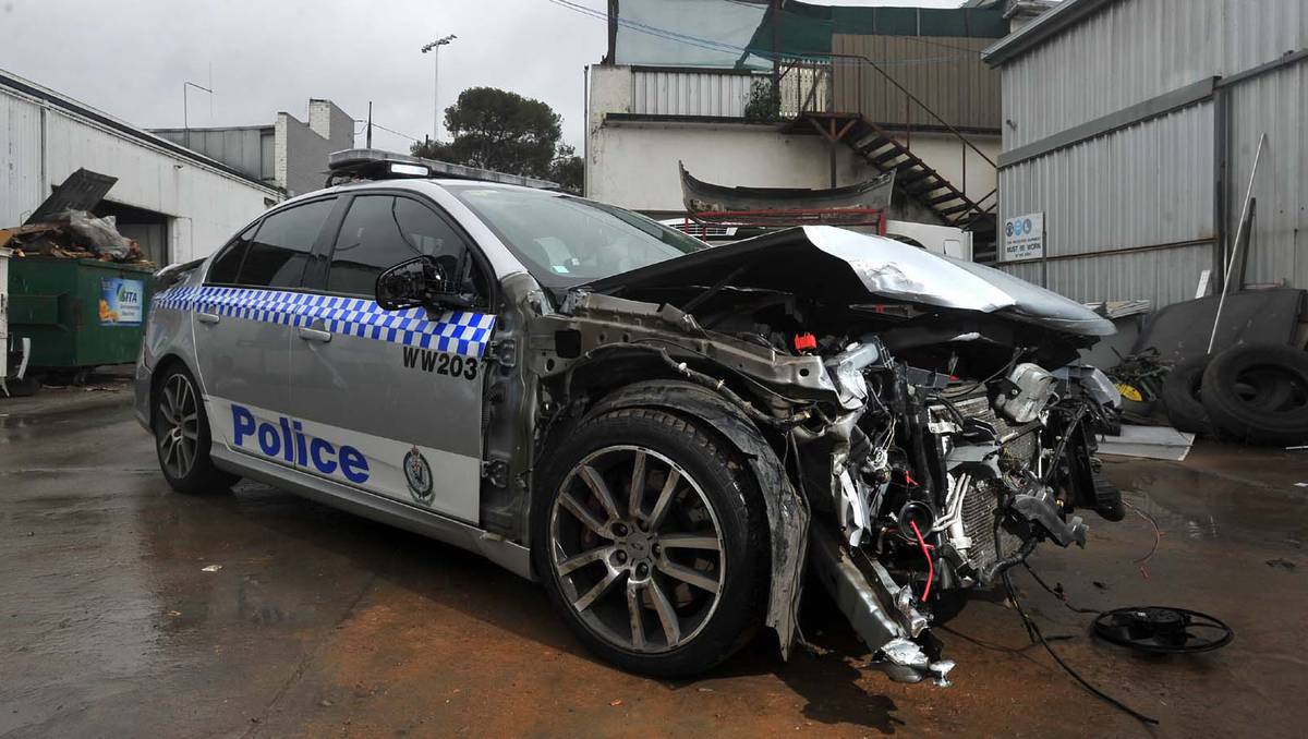 The remains of a Wagga Highway Patrol car, which was involved in a serious crash yesterday in Gundagai. Picture: Addison Hamilton, Daily Advertiser