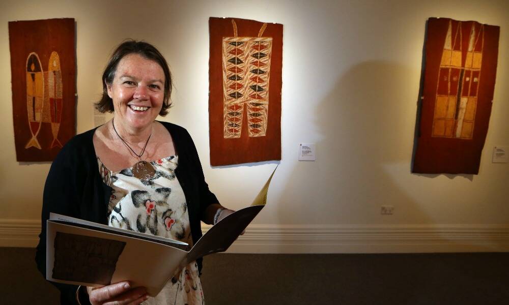 Ancestral Power and the Aesthetic exhibition, Albury Art Gallery until November 19. Curator Lindy Allen with Mildjingu bark paintings by Makani Wilingarr. Picture: KYLIE ESLER 