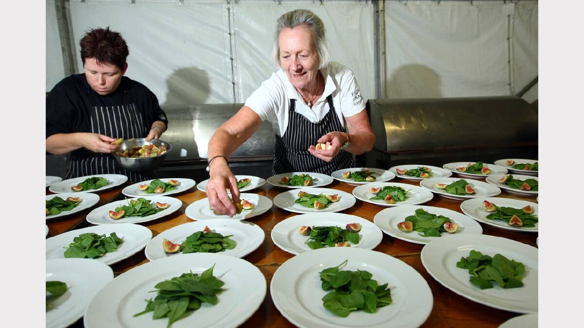 Fiona Landy, caterer, prepares meals at the Albury Gold Cup Carnival.