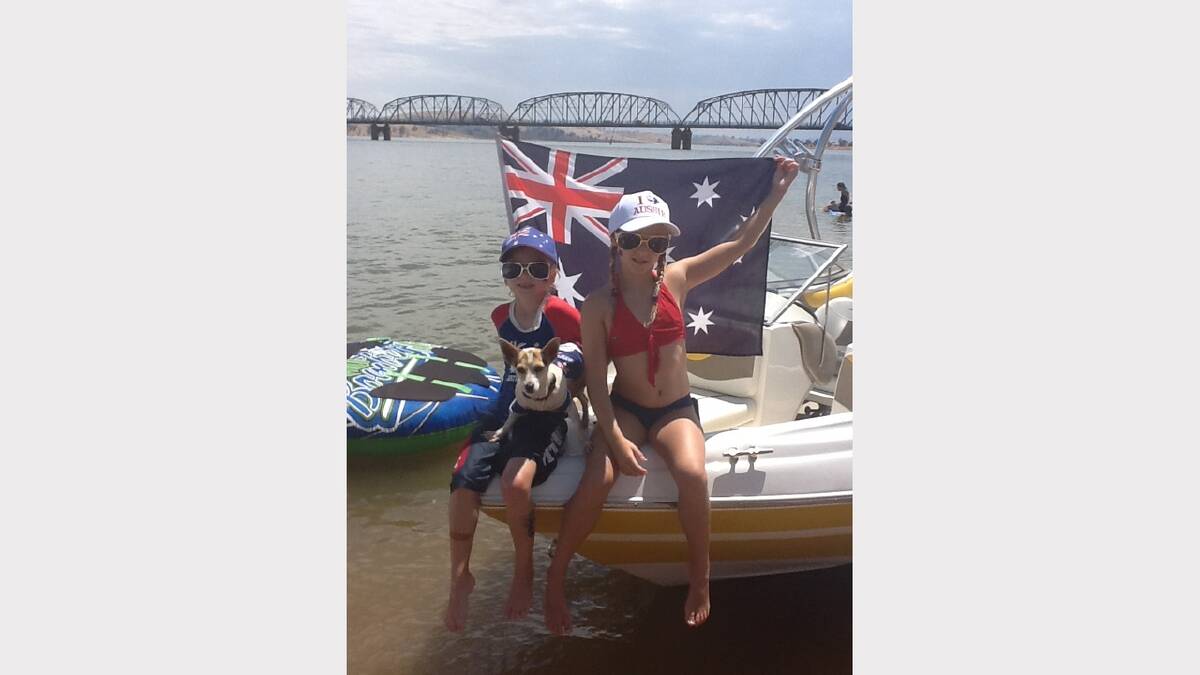 Max and Charli Jackson with dog Maggie from Bellbridge celebrate Australia Day.