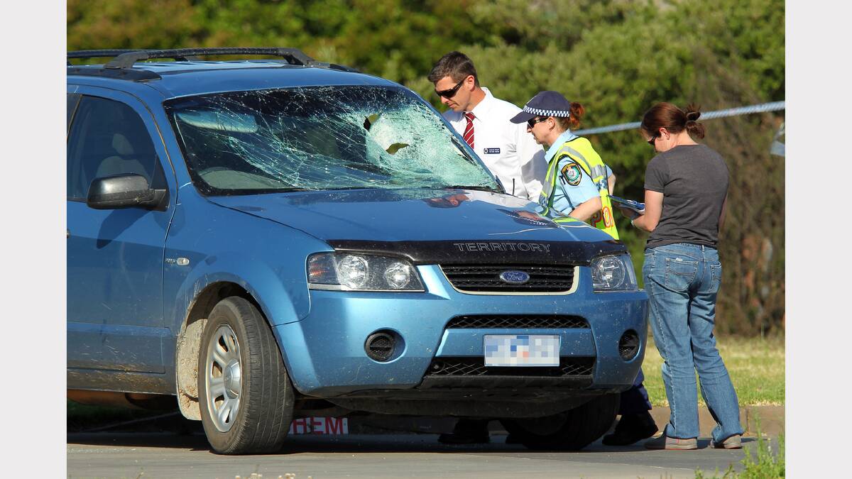 Police at the scene of the horror crash.