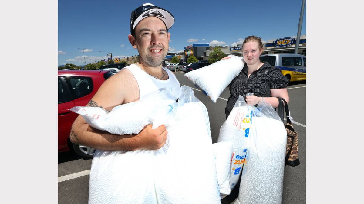 Brenten Polkinghorne and Megan Knight, both from Albury, with all the beans they bought. PICTURE Kylie Esler.