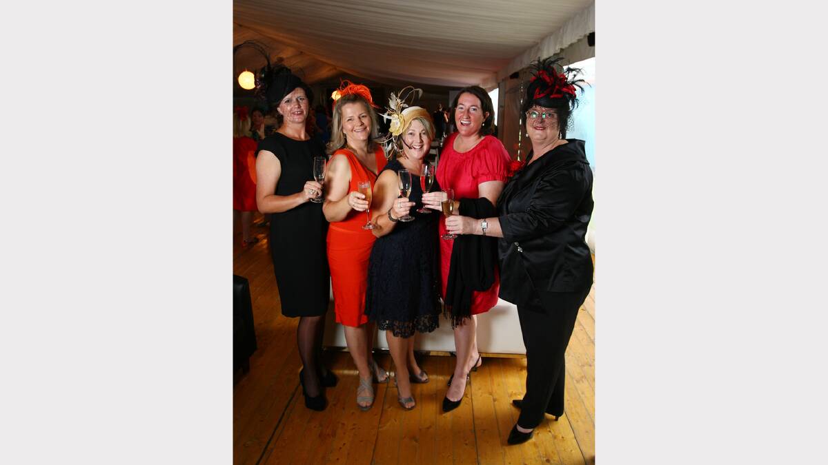  Lea Parker, of Holbrook, Jody Whitley, of Holbrook, Libby Keogh, of Mullengandra, Jane Ward, of Bowna, and Anne McNaught, of Albury, attend the Wewak St School fundraiser at the Albury Gold Cup Carnival.