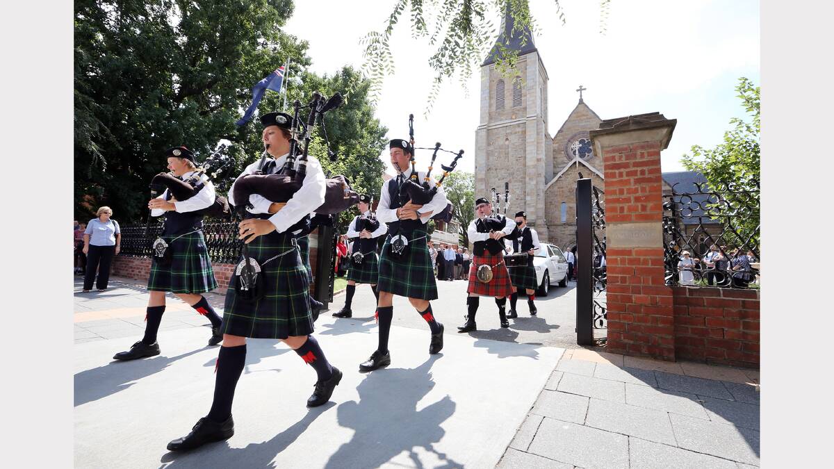 The Scots School pipers lead the cortege from St Matthew’s Church. Pictures: KYLIE ESLER