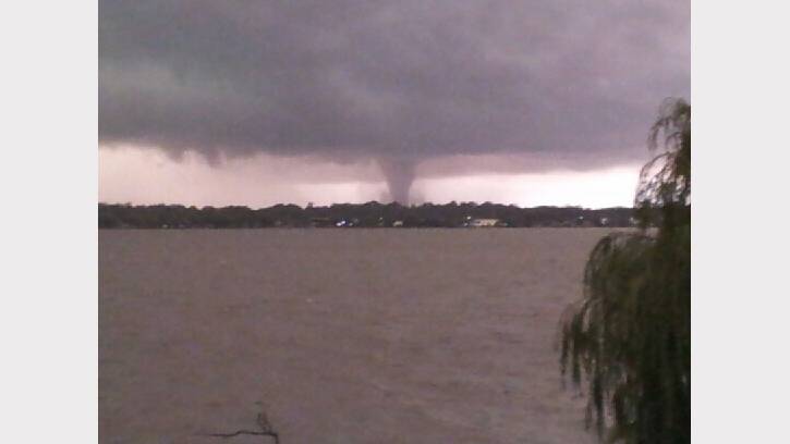 Border Mail reader Amanda Wheaton sent us this photo of the tornado forming over Mulwala.